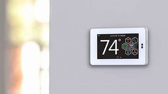 Thermostat on a white wall